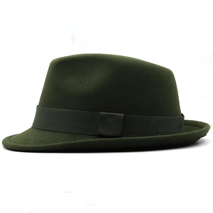Detailed side view of dark green wool felt fedora hat with matching grosgrain ribbon