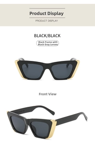 Detail view of black cat eye sunglasses with gold metal accents and model specifications