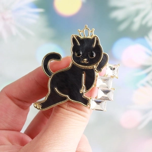 Elegant black cat brooch with gold crown and white crystals for a stylish look