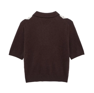 Detail of dark brown knit polo shirt with argyle pattern on shoulders and ribbed hem