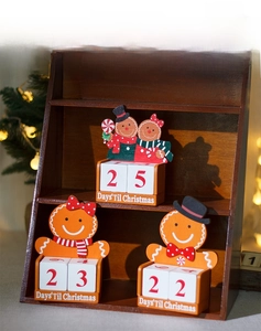 Wooden gingerbread couple Christmas countdown calendar with adjustable date blocks