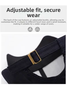 Detail of adjustable metal buckle and strap on back of navy blue cotton baseball cap