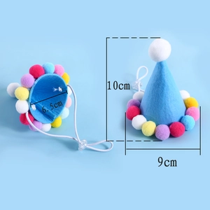Detailed size view of blue felt pet party hat with colorful pom-poms and adjustable strap
