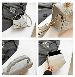 Detailed close-up of silver sequin handbag showing metal buckle, strap and interior pocket