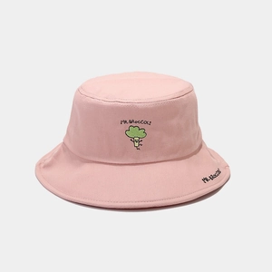 Close-up of Mr. Broccoli embroidery on pink cotton sun hat with character lettering