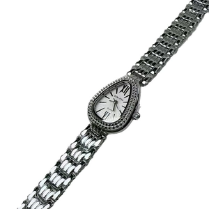 Elegant silver snake-shaped ladies watch with a teardrop dial and scales pattern strap