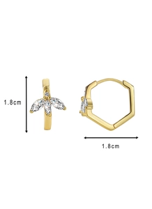 Detailed macro view of 18mm golden hexagonal earrings with marquise zircon stones