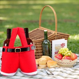 Christmas wine bottle cover in red Santa pants design for festive holiday table decoration