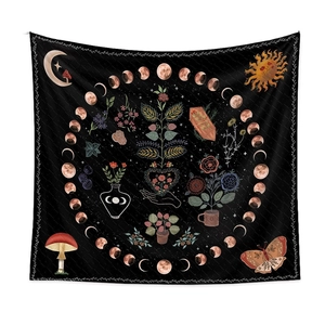 Bohemian black tapestry featuring mystical moon phases, moths and botanical art designs