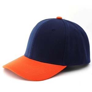 Two-tone baseball cap with navy blue crown and orange brim for outdoor sports and sun protection