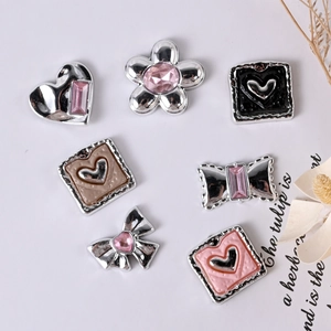 Y2K metallic resin heart and flower charms with silver plating and pink rhinestones