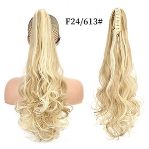 Detail view of wavy long ponytail hair extension with claw clip in F24/613 blonde mix