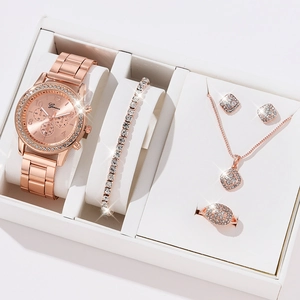 Elegant rose gold women's watch set featuring a diamond bezel and matching jewelry gift box