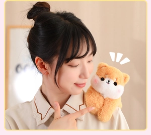 Close-up view of a cute cartoon animal plush slap bracelet accessory on a model shoulder