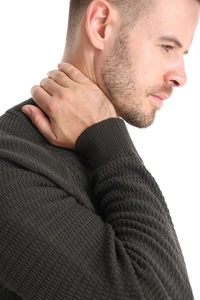 Detail of dark olive knit cardigan showing premium texture and shoulder stitching
