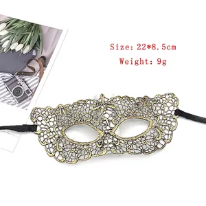 Detail view of gold and black lace masquerade mask with 22x8.5cm size specifications