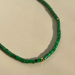 Elegant natural stone beaded necklace with green malachite texture and gold spacers