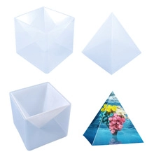 Macro detail of translucent resin cubes and pyramids for DIY chess crafts and jewelry molding
