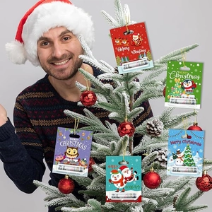 Detail of colorful Christmas money cards and lip balm holders with festive illustrations