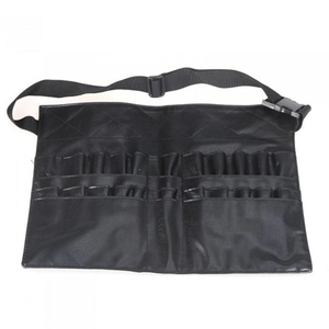 Macro detail of high-capacity black faux leather makeup brush bag with organized slots