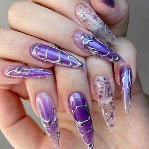 Purple almond press-on nails with silver lines and dried flower gradient design