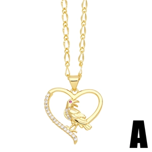 Collana a cuore dorata con pendente uccello in cristallo su catena Figaro