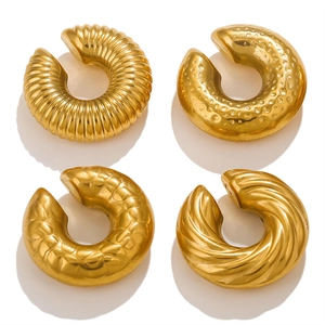Detailed set of four gold-plated titanium steel ear cuffs with various vintage textures