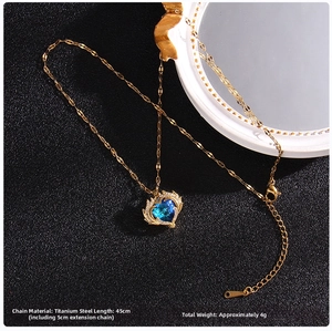 Detailed view of blue heart crystal pendant with titanium steel chain and length details