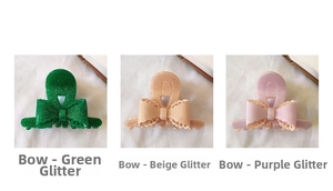 Detailed view of elegant bow hair claws in glitter green, beige, and pink colors