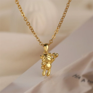 Collana con ciondolo a forma di orsetto dorato stile punk con cuore e catenina chic