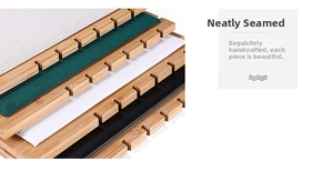 Detail of wooden jewelry display tray with velvet and leather tiered insert slots