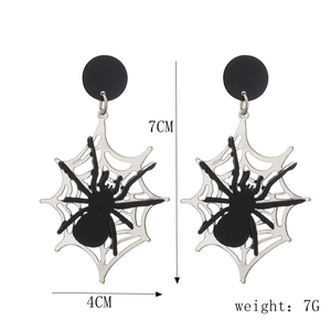 Detailed view of black and silver spider web earrings with measurements 7CM height and 4CM width