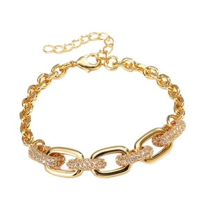Hip hop style gold oval chain bracelet with sparkling crystals and lobster clasp closure