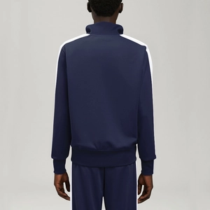Back view of men's navy blue tracksuit set with white side stripes and stand collar