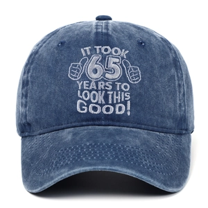 Navy blue 65th birthday baseball cap with white embroidery and washed cotton finish