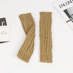 Detailed view of khaki cable-knit arm warmers made of soft acrylic yarn on white background