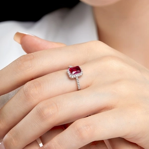 Detailed view of an S925 silver ring featuring a rectangular red zircon with pavé stones