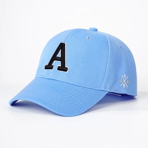 Detail of light blue baseball cap featuring bold black A and side letter embroidery