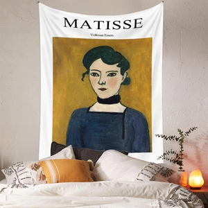 Artistic detail of Matisse expressionist tapestry hanging in a cozy bedroom setting