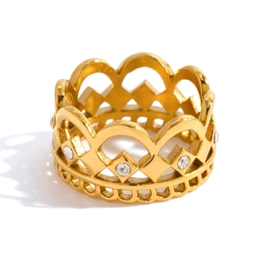Detailed view of the gold crown ring featuring hollow lace design and zircon stones