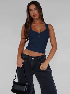 Detail of navy blue ribbed knit tank top featuring four buttons on the low U-neckline