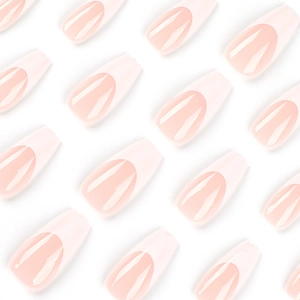 Classic pink french tip press on nails in elegant long coffin shape on white background