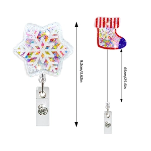Retractable Christmas ID badge holder with acrylic snowflake and stocking glitter designs