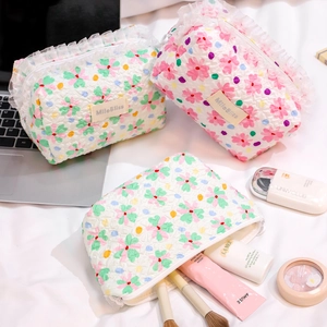 Cute floral quilted makeup bags with lace trim for portable travel cosmetic storage