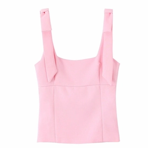 Pink sleeveless camisole top featuring unique bow shoulder straps on a clean white background