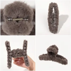 Large plush claw clip in grey faux fur shown from multiple angles for hair styling