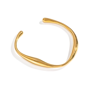 Minimalist irregular C-shaped open bangle in polished gold stainless steel for women