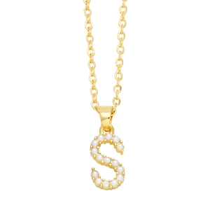 Detailed view of a gold-tone necklace with a S-letter pendant inlaid with pearls