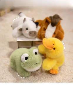 Close-up of soft plush animal toy set featuring a frog, duck, cow, and horse