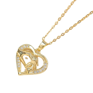 Golden heart necklace featuring a mother and child hand pendant with white zircon stones